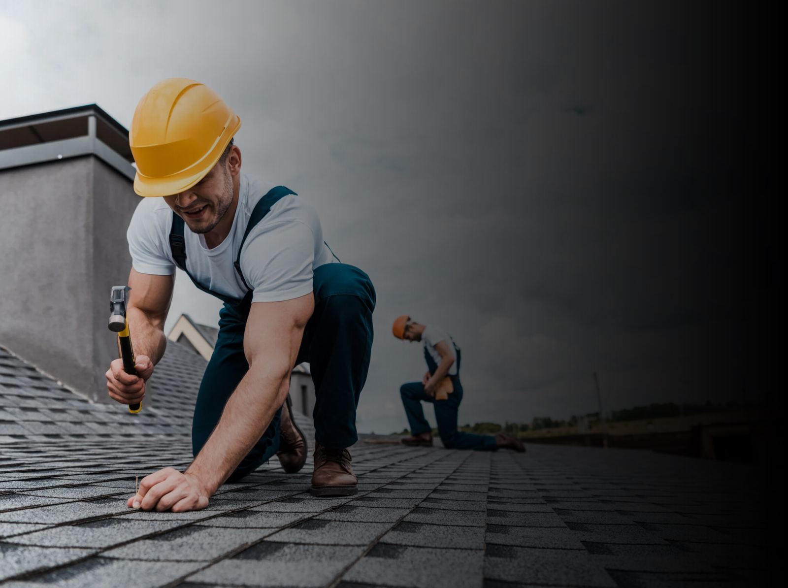 ARC roofers installing shingles on a roof